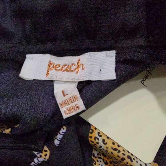 Stylish black wide-leg pants. Features a bold leopard print. - Picture 15 of 15